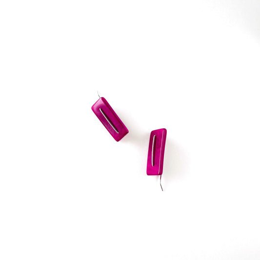 Modern laser cut tagua earrings with a handmade sterling silver hook which is attached without the use of glue.